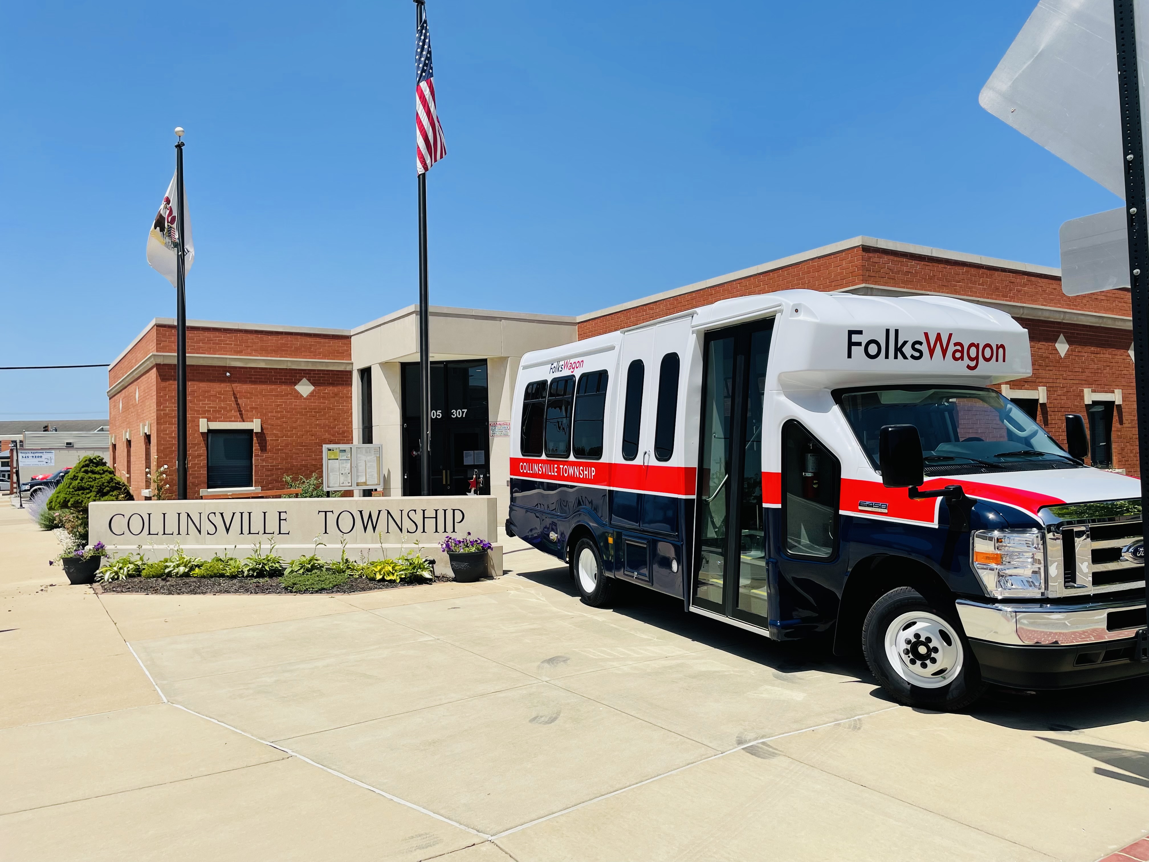 Picture Of The Collinsvilee Township Office With Folks Wagon Parked In Front